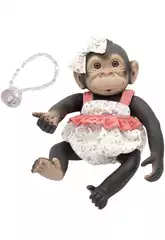 Macaco Reborn com macacão cor-de-laranja 35 cm.